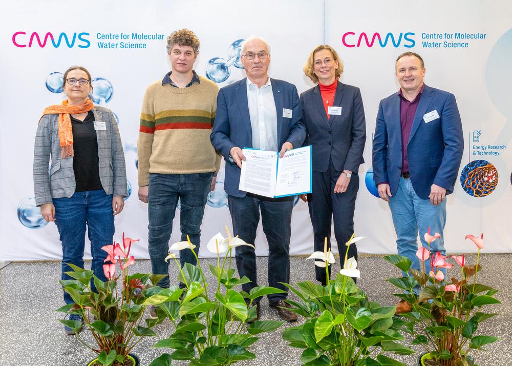 Photo of CMWS founding members and the declaration.