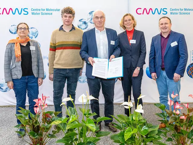 Photo of CMWS founding members and the declaration.