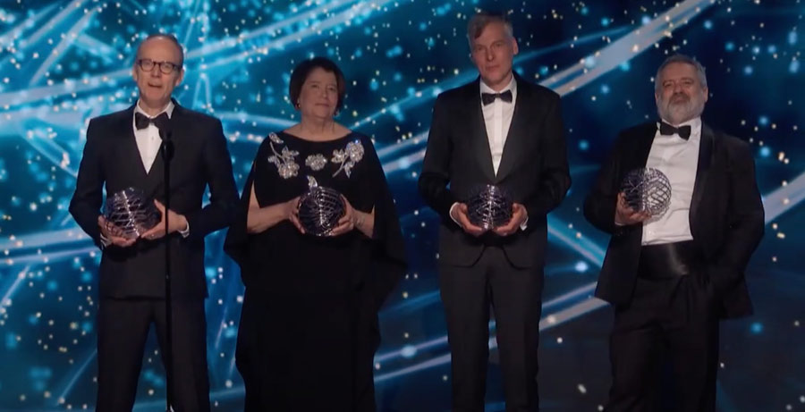 Photo of the spokespersons of the four LHC experiments at the award ceremony